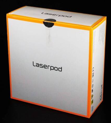 A boxed and as new Plugg laser pod, 20cm H.