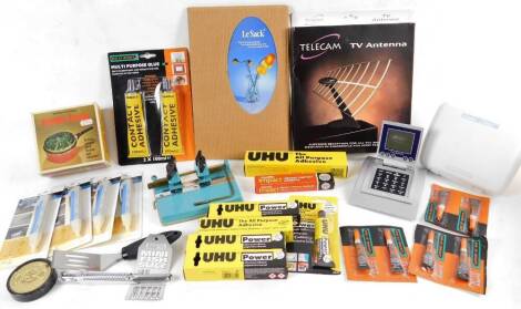 Various UHU all purpose adhesive boxes, voltage alert testers, vegetable steamer, Lakeland mini fish slice, Telecan TV antenna, etc. (a quantity)