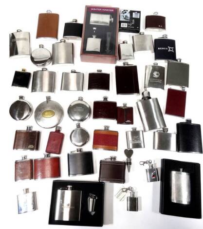 Various hip flasks, chrome plated and other types, some boxed, a curved shouldered example marked Bruadar, 15cm H, a heart shaped bottle stopper, other advertising hip flasks, etc. (a quantity)