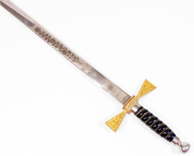 A reproduction Wilkinson dress sword, with partially etched blade, turned handle and orb pommel, 88cm L.