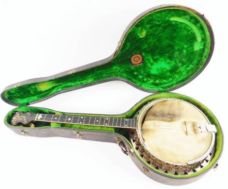 A mid 20thC Vega banjo, with chrome mounts, 80cm W. (cased)