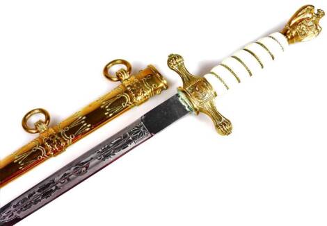 A reproduction Nazi type dagger, with Imperial Eagle pommel, turned grip handle, elaborate scabbard and etched blade, 41cm W.