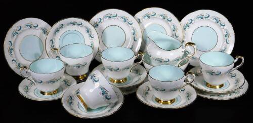 A 20thC Paragon part service, unregistered and specially commissioned pattern, in gilt highlighted scrolls, in blue on white ground, comprising of six of each cups, saucers, side plates, 16cm W, milk jug and sugar bowl, printed marks beneath. (a quantity