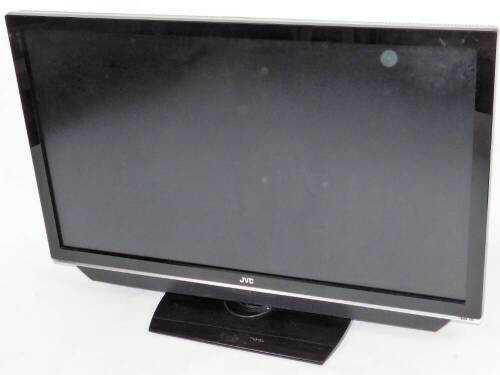 A JVC 48 inch television, in black trim with remote control and wire.