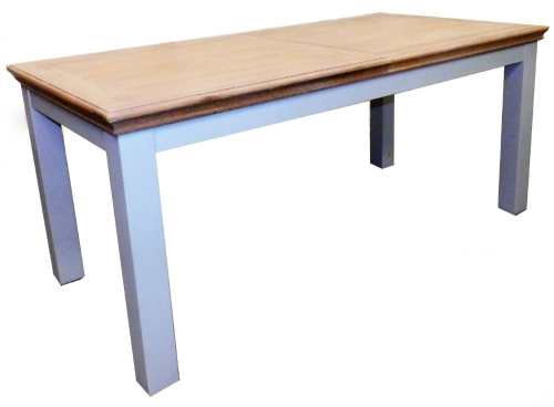 An ex-display dining table, in grey and light wood, 180cm W, 90cm D.