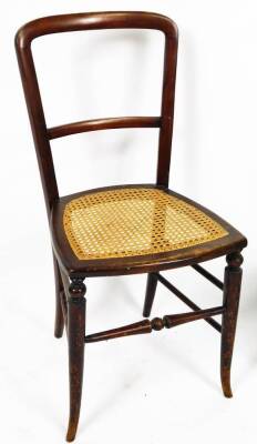 An Edwardian mahogany and boxwood strung child's chair, with horizontal back splat and overstuffed seat, on ring turned front legs, 75cm H and a further chair with bergere seat. (2) - 2