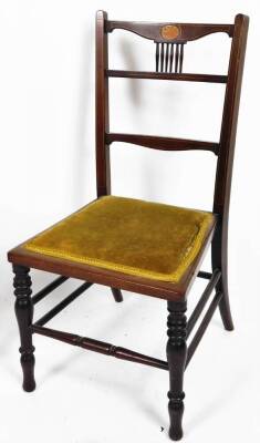 An Edwardian mahogany and boxwood strung child's chair, with horizontal back splat and overstuffed seat, on ring turned front legs, 75cm H and a further chair with bergere seat. (2) - 3