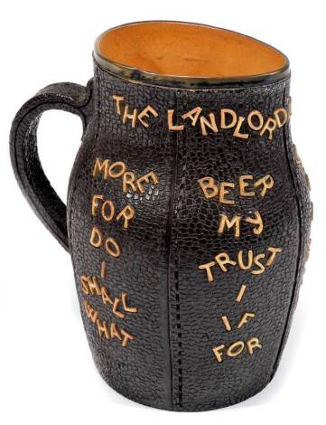 A Doulton Lambeth stoneware pottery jack jug, The Landlord's Caution, impressed marks beneath, 22cm H.