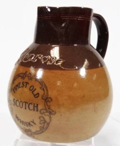 A Royal Doulton Glenrosa stoneware Scotch whisky advertising jug, in two colours, of bulbous form, with strap handle, impressed marks beneath, 17cm H.