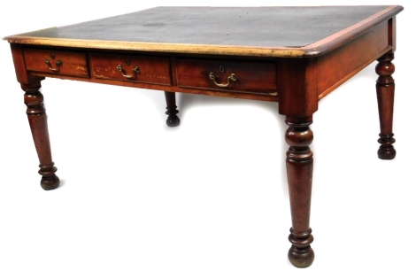 A 19thC library desk, the rounded top inset with a one piece black leather section, with three real and three dummy frieze drawers, on turned legs, 77cm H, 148cm W, 110cm D.