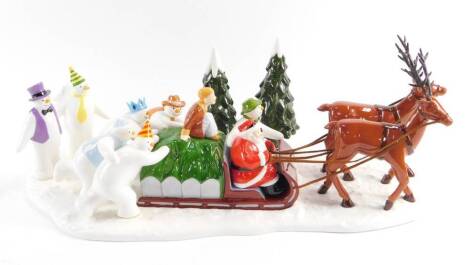 A Coalport Characters Father Christmas and the Snowman figure group, modelled as a Sleigh Ride Home, limited edition 290/500 boxed with certificate.