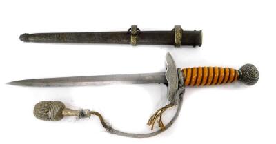 A Third Reich Luftwaffe dagger, the pommel with Swastika and oak wreath, engraved to J H Windhausen, wire bound orange grip, eagle and Swastika cross guard, tiger Soligenham blade, with scabbard, blade 25.5cm L.