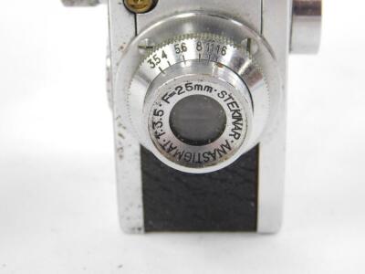 A Steky Midget camera, with a Stekinar Astigmatic lens F.3.5 F=25mm, leather cased. - 2