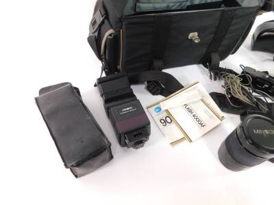 A Minolta 9000AF camera, Program 4000AF flash, zoom lens, carry case and accessories. We have specific instructions from the vendor to sell without reserve. - 3