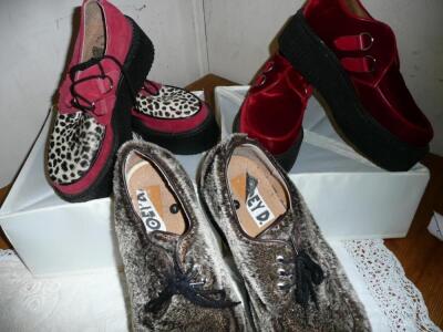 Three pairs of 'Rock N Roll' shoes - one red with animal print