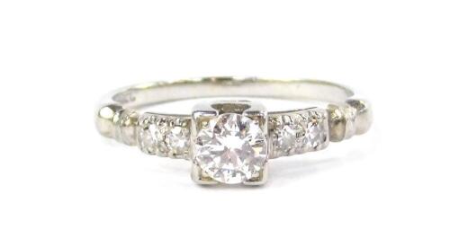 A Jabel 18ct white gold and diamond solitaire ring, with diamond set shoulders, approx 0.5cts, size H, 1.9g.