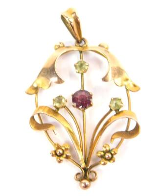 An Art Nouveau 9ct gold amethyst and peridot pendant, of scrolling floral and foliate form, 1.7g.