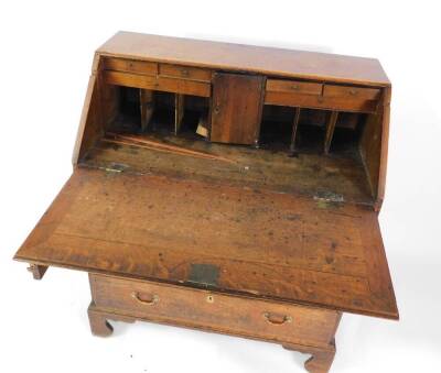 A George III oak bureau, with fall flap over four drawers, swan neck handles and bracket feet, 110cm H, 92cm W, 50cm D. - 2