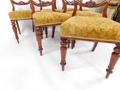 A set of six Victorian mahogany balloon back dining chairs, with over stuffed seats and turned legs. - 3