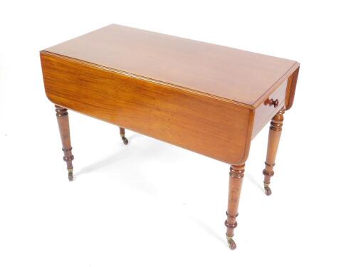 A Victorian mahogany Pembroke table, with frieze drawer, knob handle, and turned legs, 73cm H 106cm L.