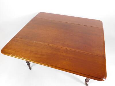 A Victorian mahogany Pembroke table, with frieze drawer, knob handle, and turned legs, 73cm H 106cm L. - 2