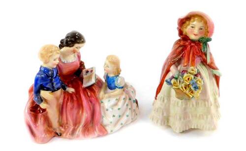 Two Royal Doulton figures, comprising Granny's Shawl, HN1647, and Bedtime Story, HN2059.