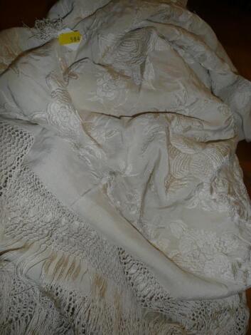 A vintage cream silk embroidered shawl with flower detail<br