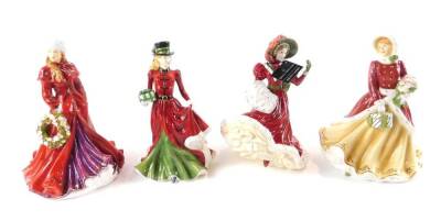 Four Royal Doulton figures, boxed with certificates, comprising Winters Dream, HN5546, Christmas Day 2005, HN4723, Holiday Greetings Christmas Day 2013, HN5583, and Christmas Day 2006, HN4899.
