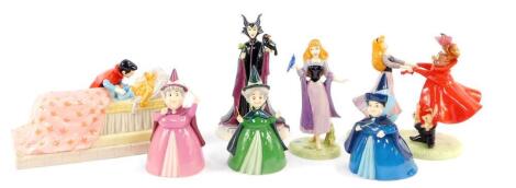 Royal Doulton Sleeping Beauty figures and groups, Disney Showcase Collection, boxed, comprising Loves First Kiss SB7, Woodland Waltz SB6, Maleficent, Stand Back You Fools! SB5, Brier Rose singing Former Thoughtful Fairy, Flora Nurturing Fairy and Merry We