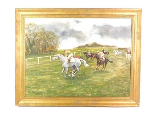 J E R Godderidge (fl.1984). Horse race coming out of the start, oil on board, signed and dated, 56cm x 80cm.