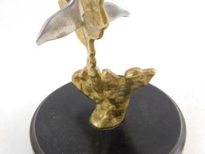 An aluminium and brass sculpture of a dolphin, modelled on sea weed, on a circular base, 25cm H. - 2