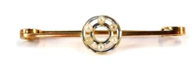 A Victorian bar brooch, with central circle panel, white metal, set with three seed pearls on a yellow metal bar, unmarked, in fitted case, 5cm W, 2.7g all in.