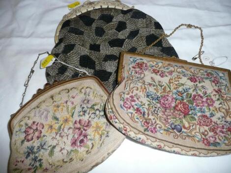 Two vintage tapestry purses with decorative clasps and chain handles