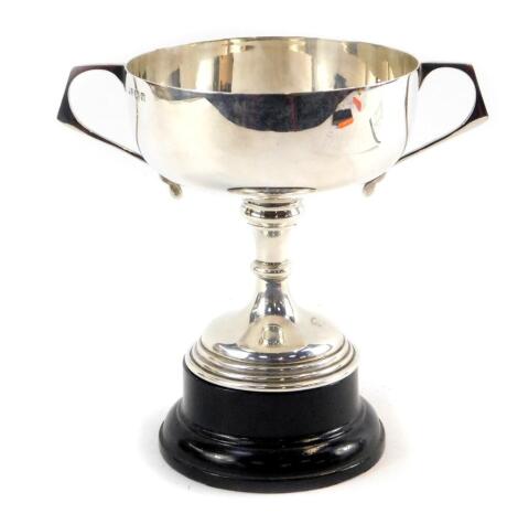 A George V silver twin handled trophy, with socle, Birmingham 1923, 6.47oz.