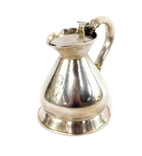 A Victorian silver flagon, with a hinged lid, presentation engraved, Henry Atkins, Sheffield 1896, 8.33oz.