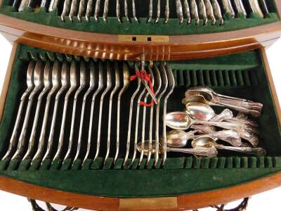 An Harrison Bros & Howson silver plated canteen of cutlery, decorated in the Kings pattern, together with additional fish knives and forks, contained in a mahogany bow fronted chest, 47cm W, 35cm D. - 4