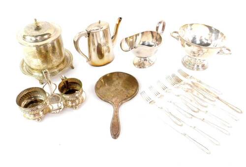 A George V silver backed hand mirror, Birmingham 1923, silver plated fish knives and forks, strawberry set, biscuit barrel, an Usher coffee pot, Elkington plated sauce boat, and a twin handled bowl. (qty)