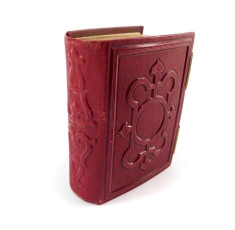 A Victorian red leather album of Carte de Visite, portrait photographs, photos of Venice, etc.