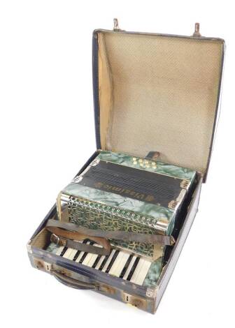 An early 20thC Vissimio piano accordion, the casing with green cracked ice decoration, eight button cased.