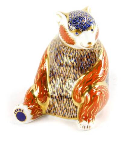 A Royal Crown Derby Imari paperweight, modelled as a seated Honey Bear, boxed.