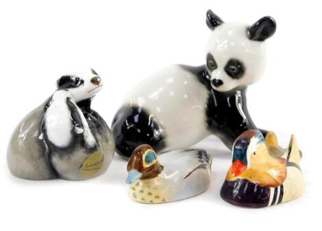 Two Beswick Peter Scott models of a teal and Mandarin duck, Beswick figure group of a pair of entwined badgers, and a Lomonosov porcelain figure of a panda. (4)