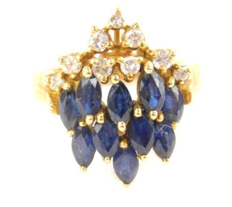 An 18ct gold sapphire and diamond ring, size L, 7.3g.