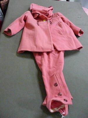 A collection of vintage childrens clothes including CC41 pink romper suit
