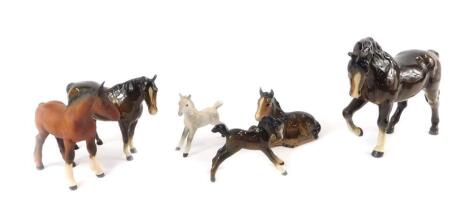 Two Beswick figures of brown gloss horses, two gloss foals and a dappled grey foal, together with a matt brown foal. (6)