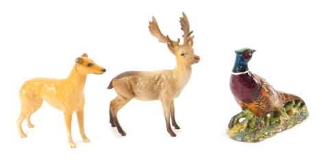 A Beswick figure of a pheasant 1226, Beswick stag, and a Beswick greyhound Jovial Roger. (3)