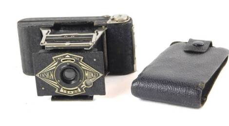 A Houghton Butcher Ensign Midget camera, c1930s, with leather outer casing.