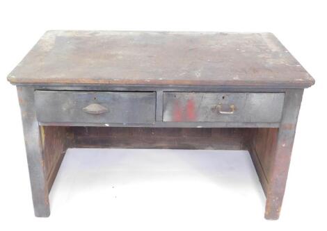 A Victorian pitch pine work table, with two frieze drawers, raised on panelled and square leg supports, 80.5cm H, 137cm W, 77cm D.