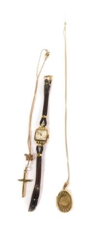 A Rotary lady's 9ct gold cased wristwatch, square dial bearing Arabic numerals at evens, together with a 9ct gold oval photo locket on chain, and a 9ct gold cross on chain, 19.6g all in.