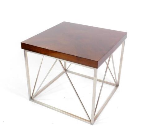 A Continental stained birch quarter veneered occasional table, raised on aluminium supports, 70cm W, 61cm H.