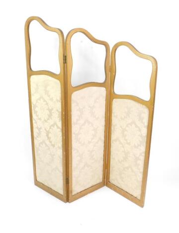 A Victorian late 19thC gilt wood three fold screen, the folds of graduated form, inset glass to the top above fabric panels, one glass panel lacking, 166cm H, 136cm W.
